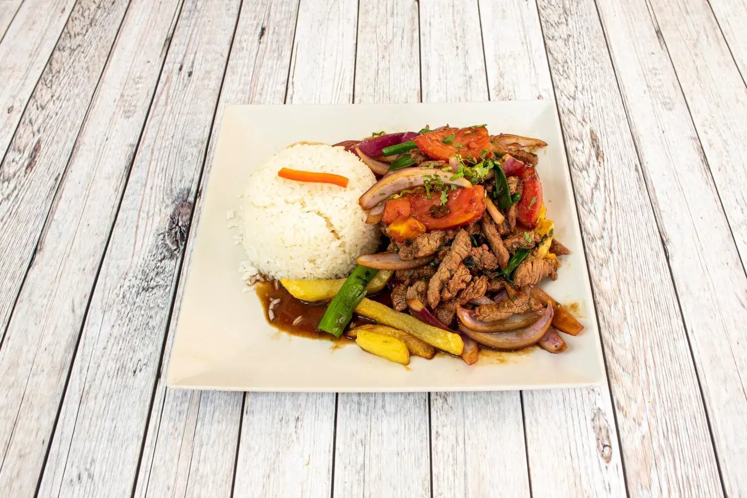 Lomo Saltado Lomo Saltado https://4kym48m6w0dj35od.public.blob.vercel-storage.com/dishes/internal/lomo-saltado-1759360916089.webp